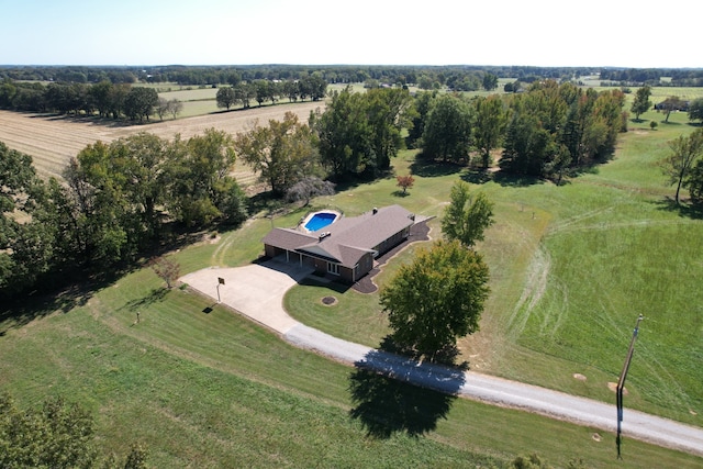 birds eye view of property with a rural view