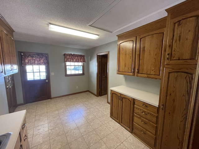 kitchen featuring a textured ceiling