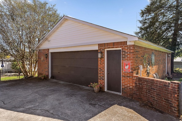 detached garage with fence