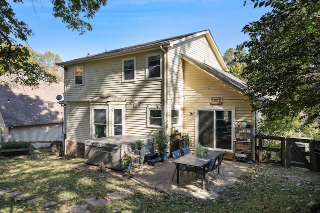 back of property with a patio area