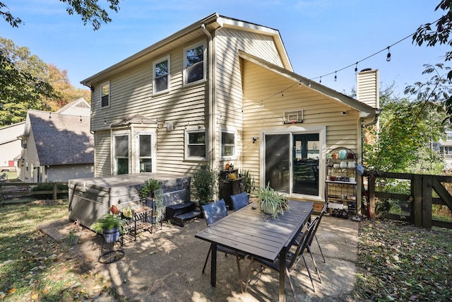 back of house featuring a patio