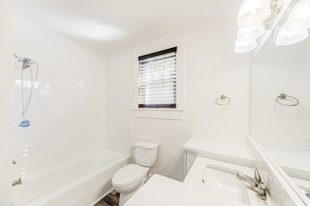 full bathroom with toilet, shower / bathing tub combination, hardwood / wood-style flooring, and vanity