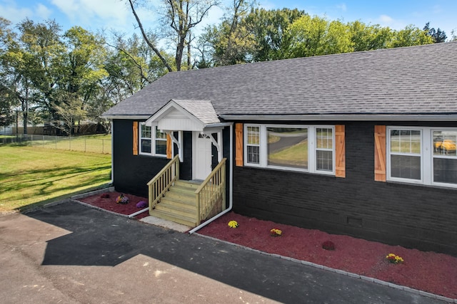 view of front of house with a front yard