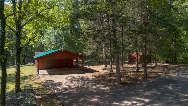 view of property's community featuring an outdoor structure