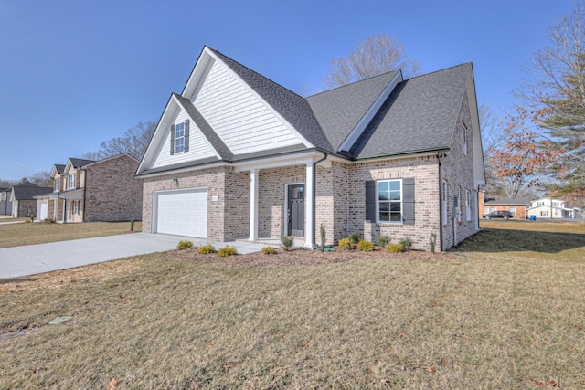 view of front of house featuring a garage and a front yard