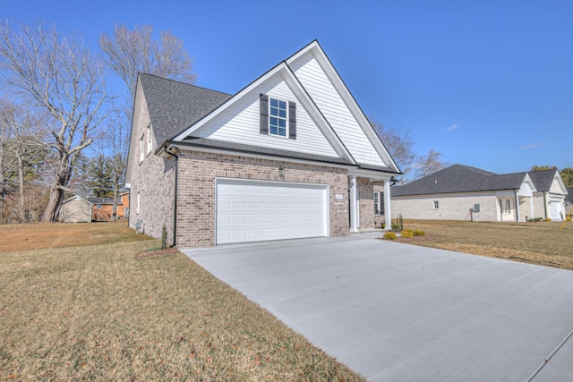 view of front of home with a garage and a front yard