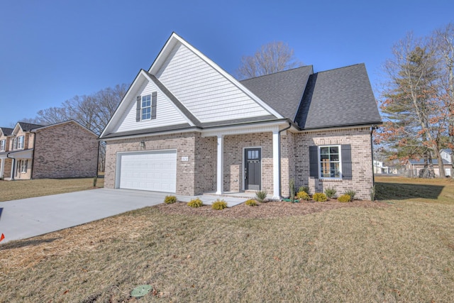 view of property with a garage and a front yard