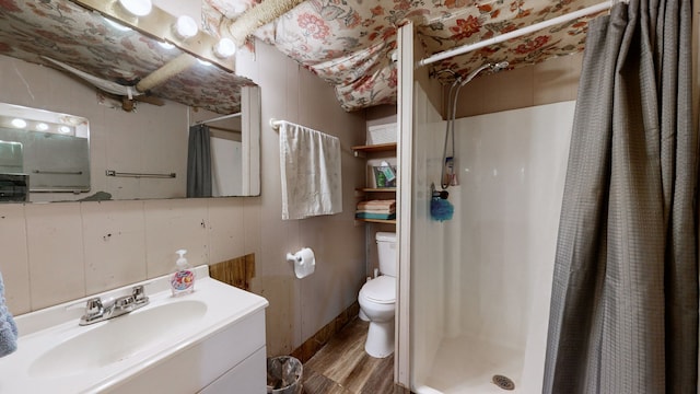 bathroom featuring vanity, wood-type flooring, a shower with curtain, and toilet