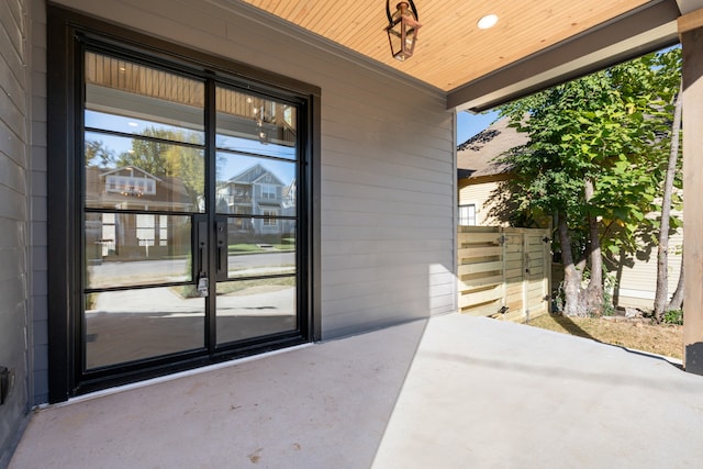 entrance to property with a patio area