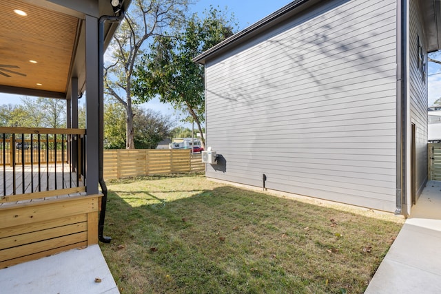 view of yard with a wooden deck