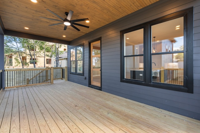 wooden deck with ceiling fan