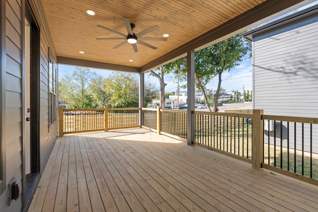 wooden terrace featuring ceiling fan