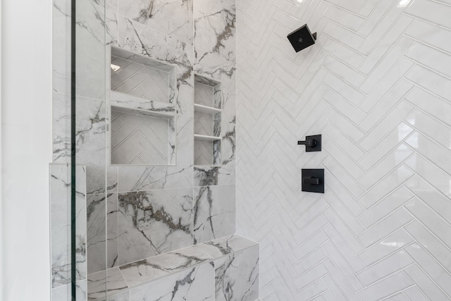 room details with a tile shower