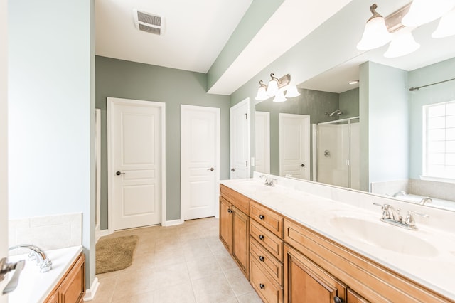 bathroom featuring vanity, shower with separate bathtub, an inviting chandelier, and tile patterned flooring