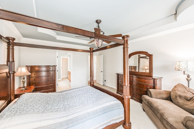 bedroom featuring ornamental molding, a raised ceiling, and ceiling fan