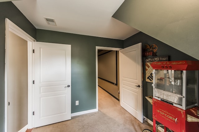 interior space with light colored carpet