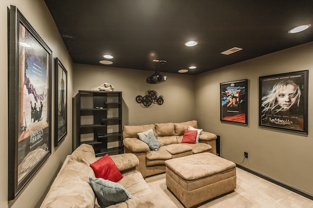 cinema room with light carpet