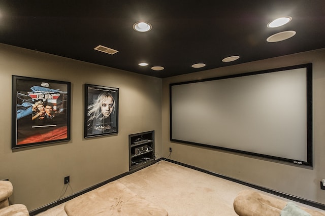 home theater featuring light carpet