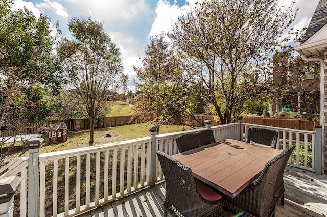 deck featuring a lawn