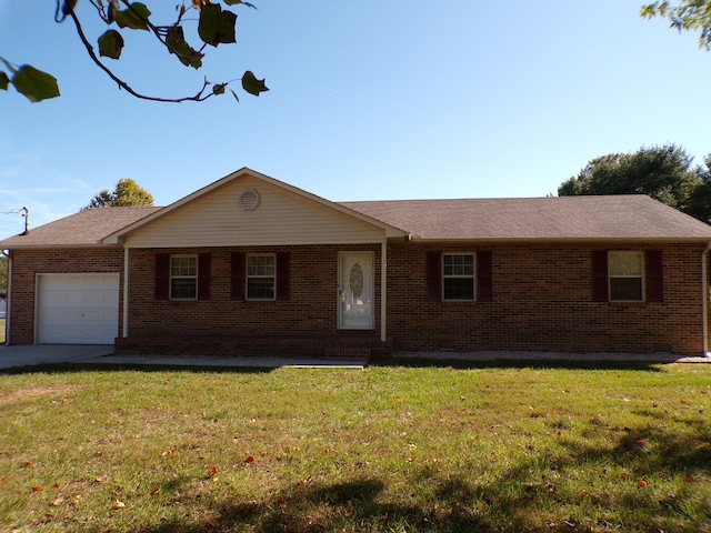 ranch-style home with a front lawn and a garage