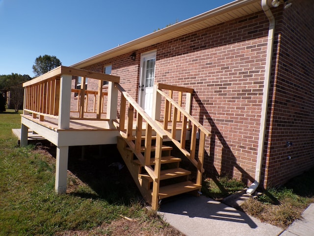 view of home's exterior featuring a deck