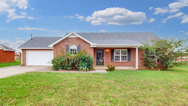 single story home with a garage and a front lawn