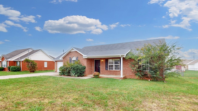 view of front of home with a garage and a front lawn