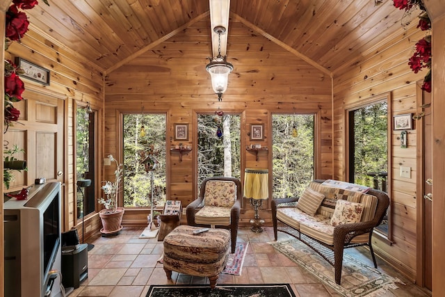 sunroom / solarium featuring wooden ceiling and lofted ceiling