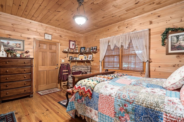 bedroom featuring wooden walls, wood ceiling, a fireplace, and light wood-type flooring