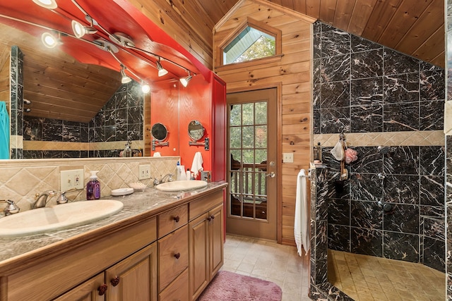 bathroom featuring vanity, wood ceiling, lofted ceiling, and walk in shower