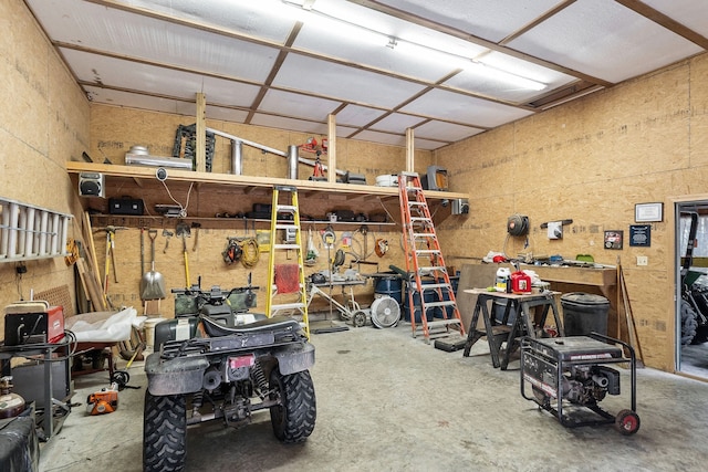 garage featuring a workshop area