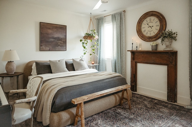 bedroom featuring ceiling fan and ornamental molding