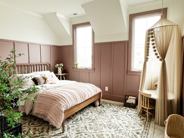 carpeted bedroom featuring ornamental molding