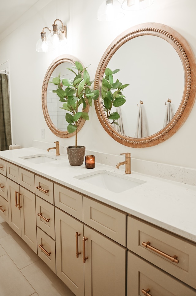 bathroom with vanity and tile patterned flooring