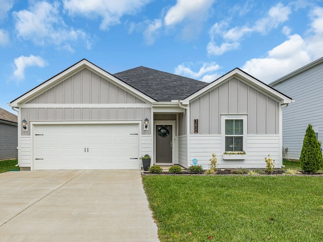 view of front facade featuring a garage and a front lawn