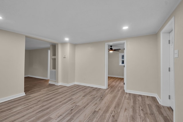 unfurnished room with light hardwood / wood-style flooring and ceiling fan