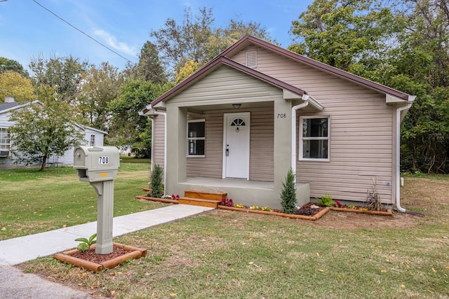 bungalow with a front lawn