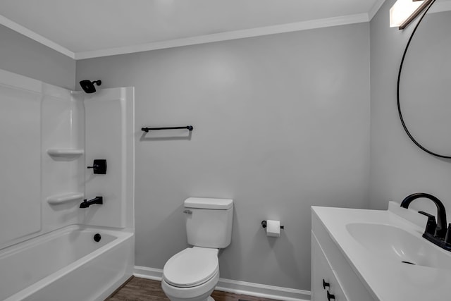 full bathroom featuring toilet, shower / bath combination, hardwood / wood-style floors, crown molding, and vanity