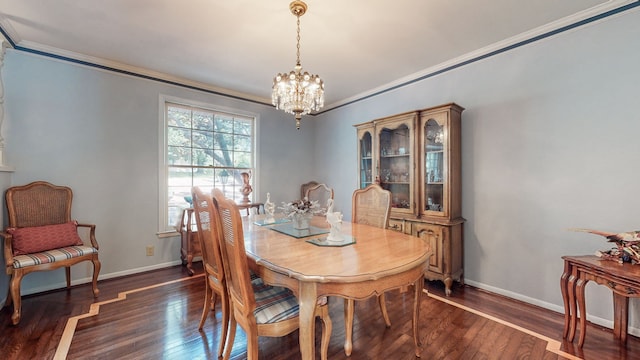 dining area with crown molding, dark hardwood / wood-style floors, and a notable chandelier