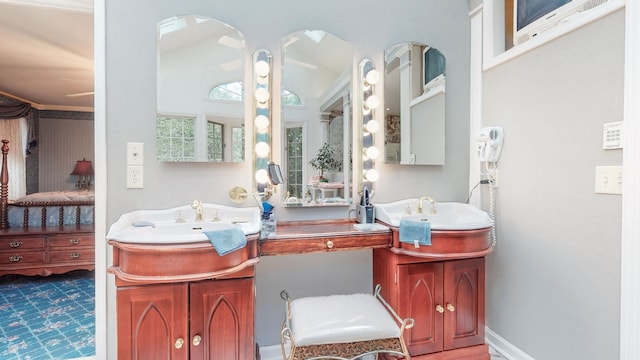 bathroom with vanity and ceiling fan