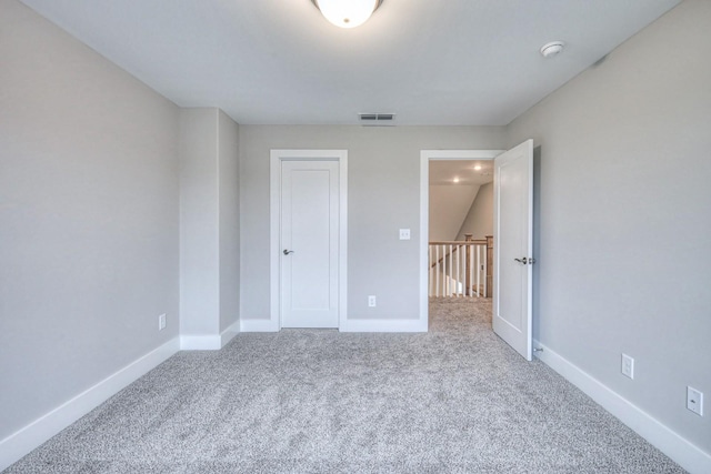 unfurnished bedroom featuring carpet floors