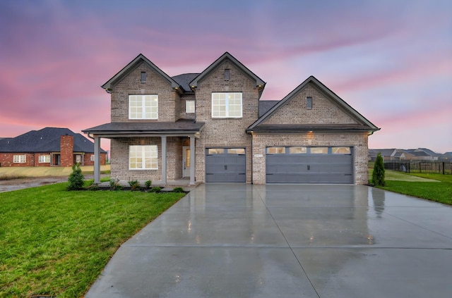 craftsman-style home featuring a yard