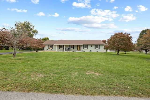 ranch-style home featuring a front yard