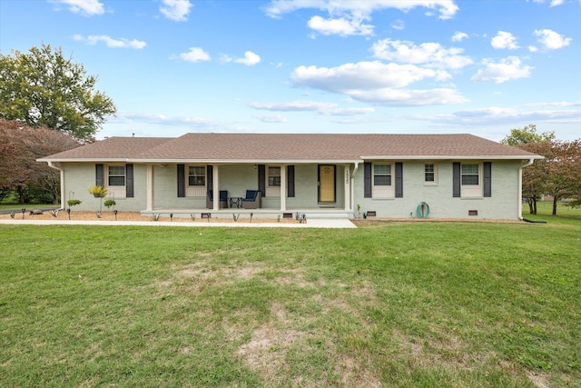 ranch-style home featuring a porch and a front yard