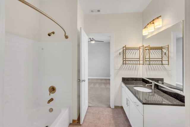 bathroom with tile patterned floors, ceiling fan, vanity, and shower / bathtub combination