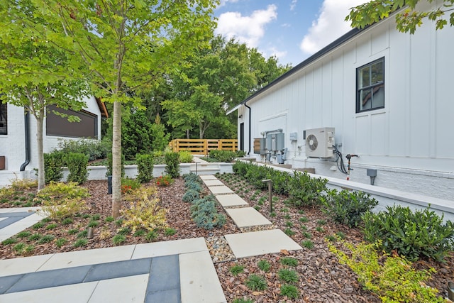 view of yard with a patio and ac unit