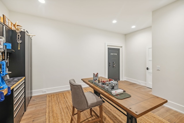 home office featuring hardwood / wood-style flooring