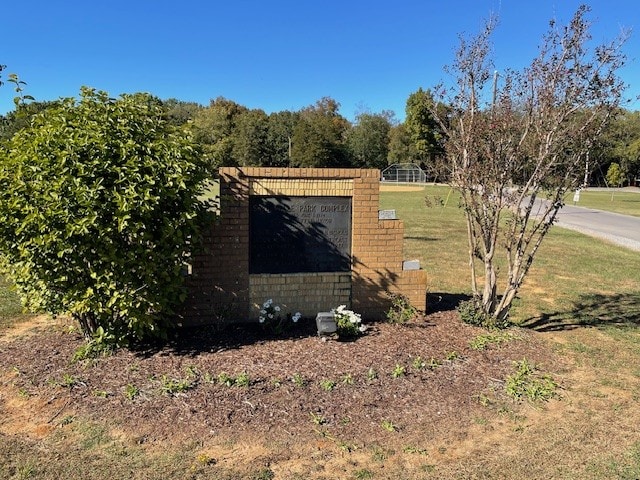 view of side of property featuring a yard