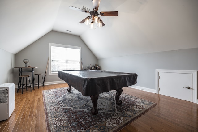 rec room featuring billiards, wood finished floors, visible vents, vaulted ceiling, and baseboards