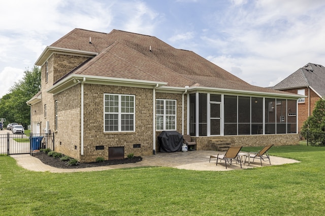 back of house with a yard, a patio, crawl space, a sunroom, and fence